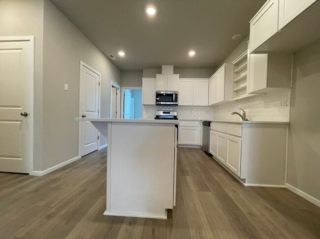Photo - Modern 3-Bed, 2.5-Bath Home with Quartz Counters, Central A/C, and Prime Location!