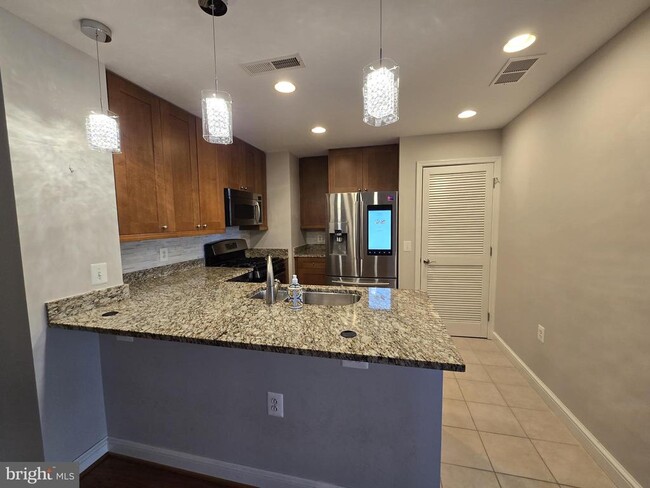 Photo - 11990 Market St Unit 208