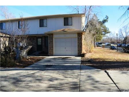 Building Photo - COZY END UNIT TOWN-HOME IN LONGMONT AVAILA...