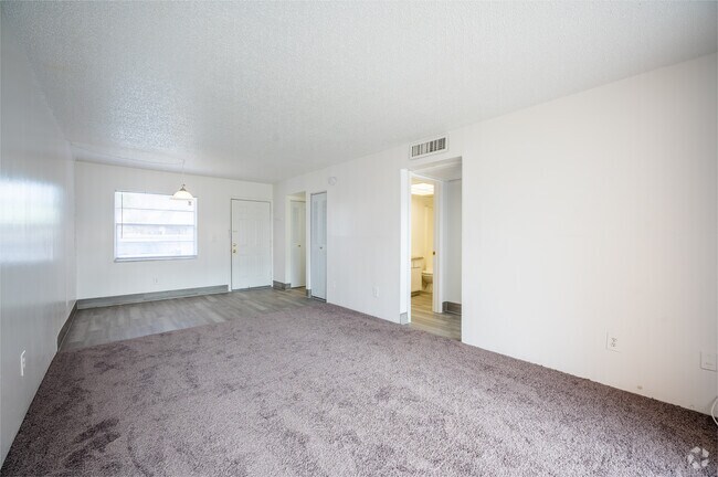 1BR, 1BA - 700SF - Living and Dining Rooms