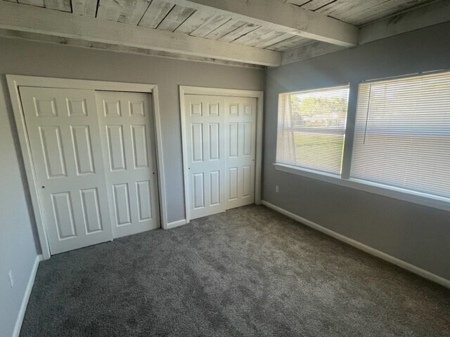 Bedroom with Large Closets - Chalet Apartments