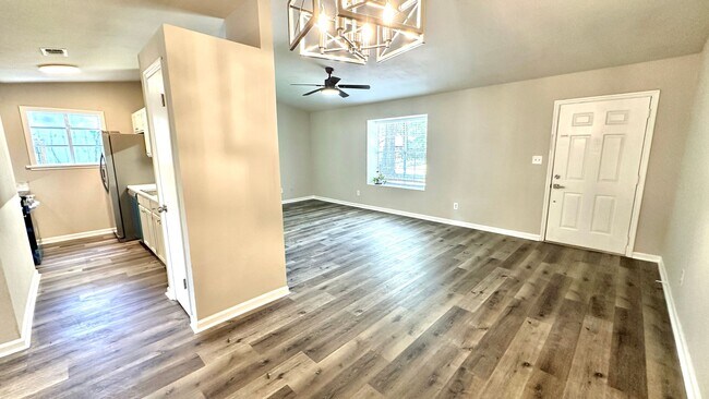 Photo - RENOVATED 2/2 w/ Updated Flooring, Paint, Appliances, & Fixtures! Open Floor Plan & Fenced Yard! ...