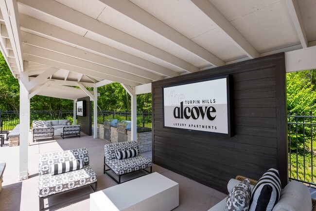 Alcove Pool Area - The Alcove of Turpin Hills Apartments