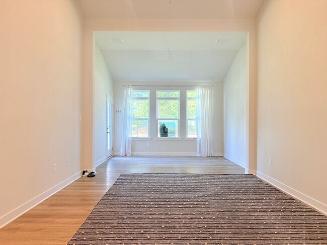 Photo - Coastal Luxury Living in River Run – Minut...