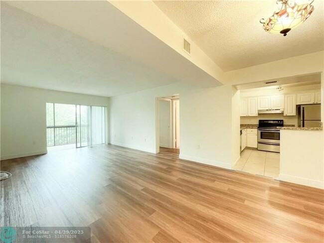 Photo - 711 N Pine Island Rd Condo Unit 302