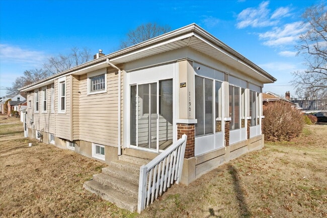 Photo - "Charming 3-Bed Haven with Hardwood Floors & 2 Full Baths in St. Louis!"  Hazelwood Schools.  Sec...