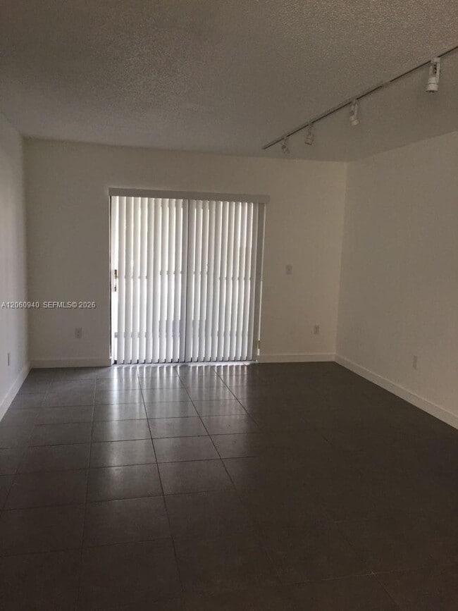 Photo - 860 NE 209th Terrace Unit 104-33