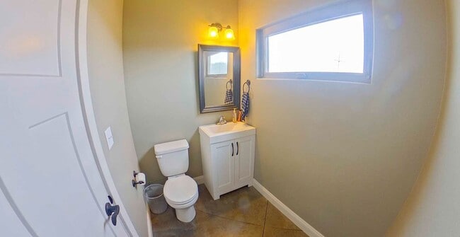 Photo - Cute West Side Home W/ Two Car Garage + Fenced In Yard + Rooftop Balcony! Available June 4th!