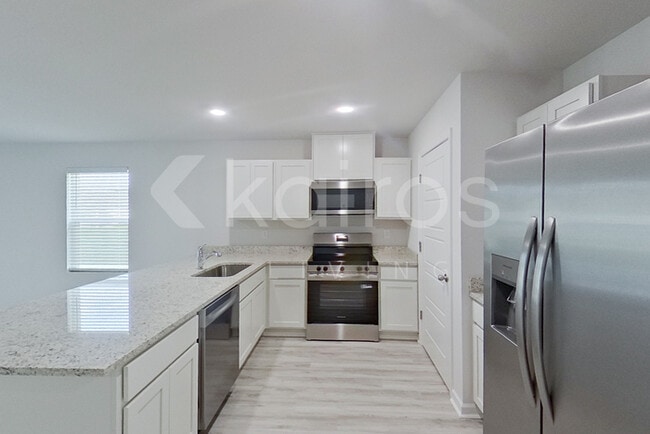 Photo - 14219 War Admiral Ave