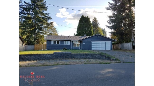 Building Photo - Beautiful Remodeled Rambler!!!  Come enjoy this HUGE backyard!!  NEW CARPET!!