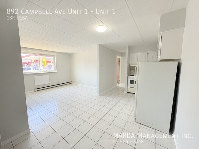 Photo - COZY 1 BED/1 BATH MAIN FLOOR UNIT -WALKING DISTANCE TO U OF W + HYDRO! Unit 1