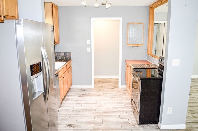 Photo - Check out this huge private fenced back yard at this Timberlane home!