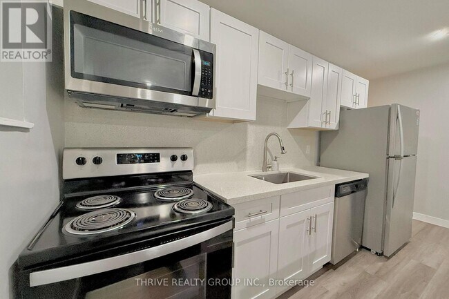 Photo - 100 King Edward Ave Unité 7