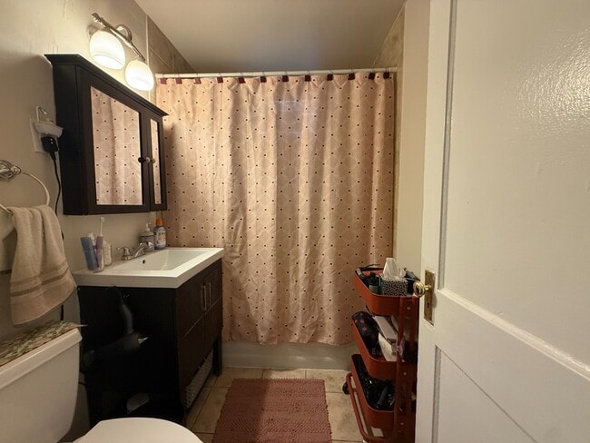 Photo - Rogers Park 2 Bed 1 Bath With Central AC & Heat, Beautiful Sunroom, Dog Friendly, Available July ... Unit 2