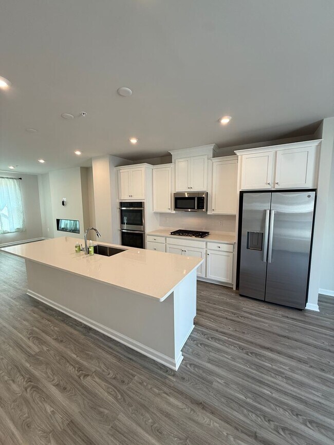 Photo - Luxury 3BR Townhome in Shipley Homestead | Quartz Kitchen, Fireplace & 2-Car Garage