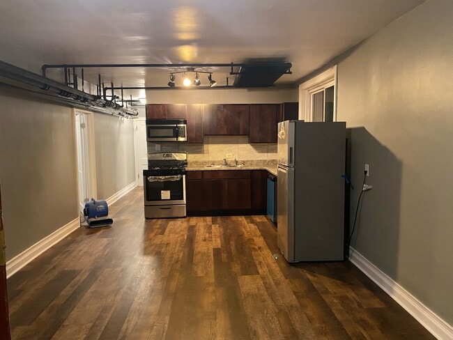 Open concept kitchen living room - 8425 S Marquette Ave Unit 1
