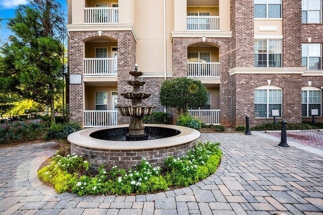 Elegant fixtures cultivate a European-styled courtyard