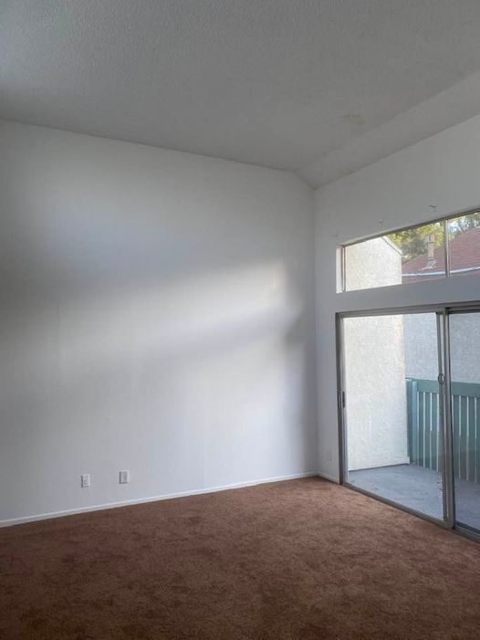 High Ceiling Living Room - 5700 Etiwanda Ave Condo