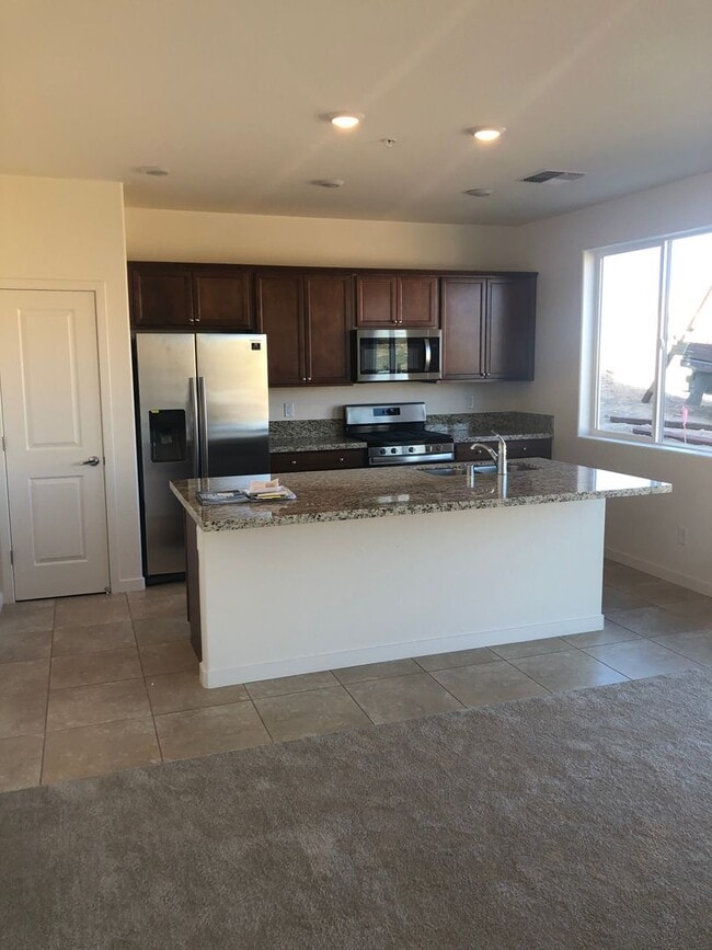 Photo - CORNER LOT - END UNIT - NO YARD TO MAINTAIN - GRANITE - STAINLESS - GATED