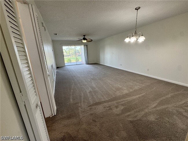 Building Photo - 12250 Tamiami Trl E Unit B-301