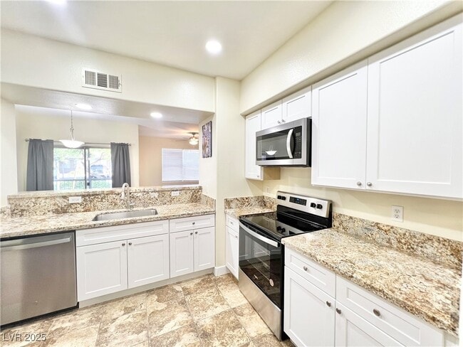 Building Photo - 8000 W Badura Ave Unit 1050