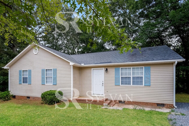 Building Photo - Cute, cozy and comfortable