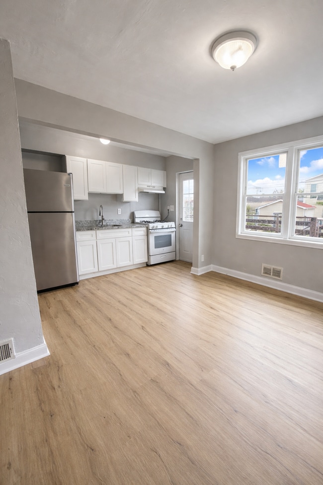 Photo - Home with Modern Kitchen, Finished Basement & Backyard Deck