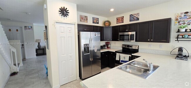 Building Photo - 9208 W 33rd Ct Rental