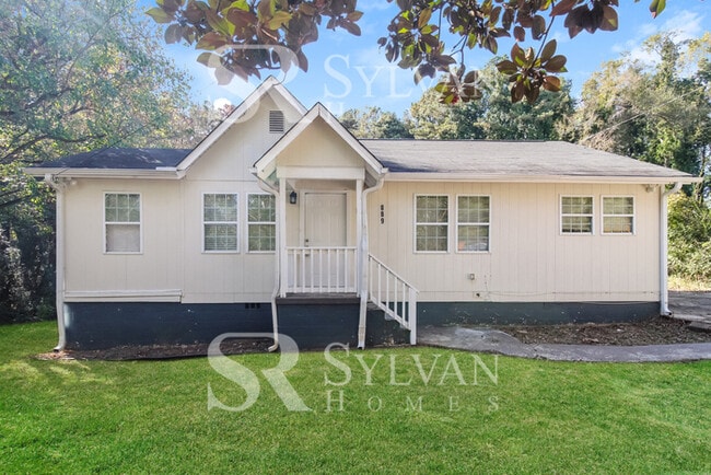 Building Photo - The living is easy in this 3 bedroom, 2 ba...
