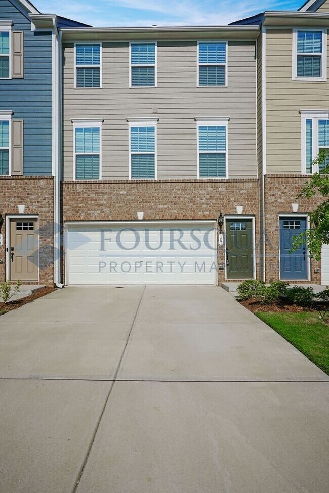 Spacious 3-Story Townhome with Bonus Suite & 2-Car Garage – In the Heart of RTP
