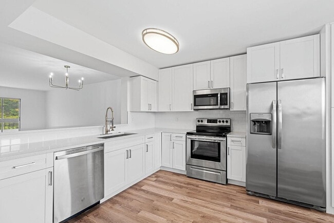 Building Photo - 7301 Amberly Ln Unit 403