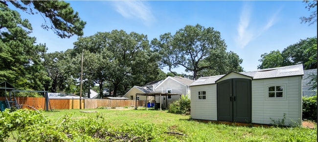Covered patio with water view and large shed - 2605 Bapaume Ave
