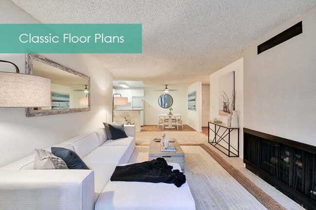 Living room with fireplace at The Meadows Apartment Homes