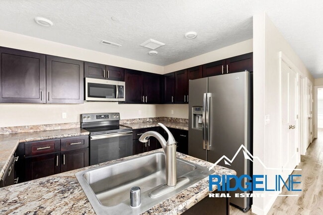 Building Photo - 1110 American Ave Unit 9