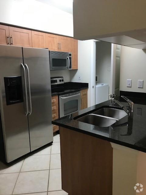 Building Photo - 6530 Emerald Dunes Dr Unit 106 Rental