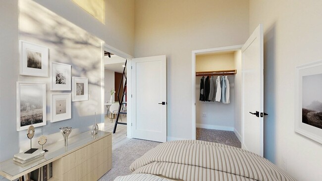 Comfortable Bedroom with Attached Closet in One-Bedroom Apartment - The Roost Apartments