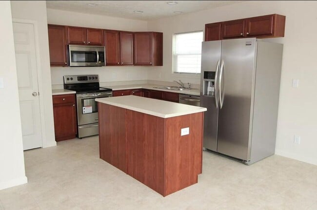 Photo - LINDBERG VILLAGE...3 Bedroom 2 Bath House w/ fenced backyard