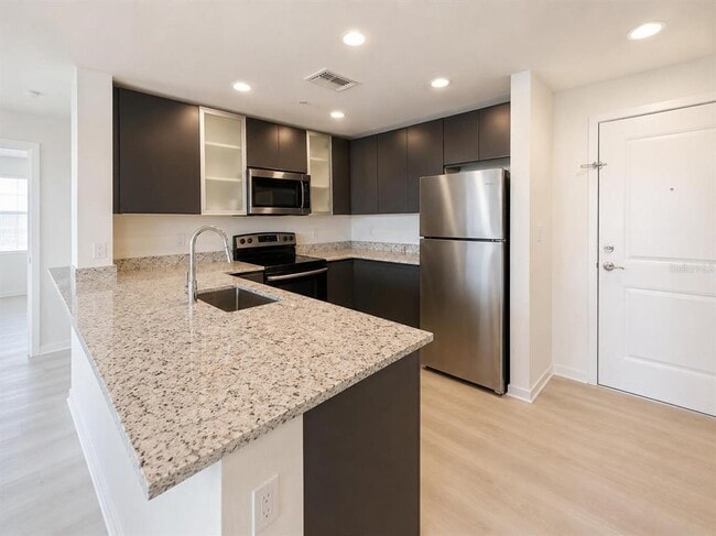 Building Photo - 5587 Millennia Park Dr Unit 424
