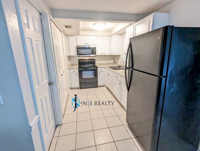 Photo - NEW FLOORS, NEW PAINT INSIDE & OUT.. 2/1/1...