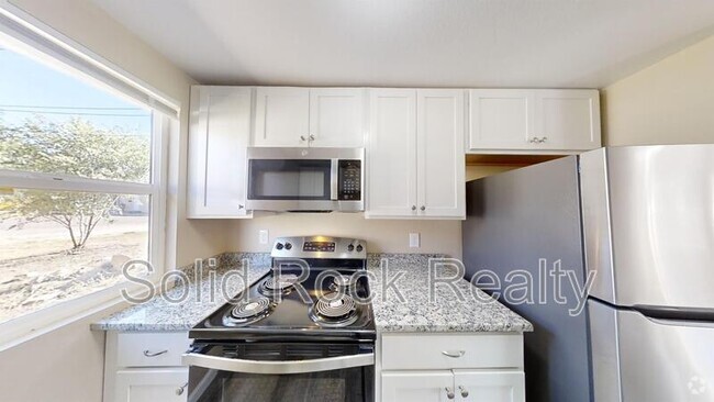 Building Photo - 2405 E St Vrain St Unit 105 Rental