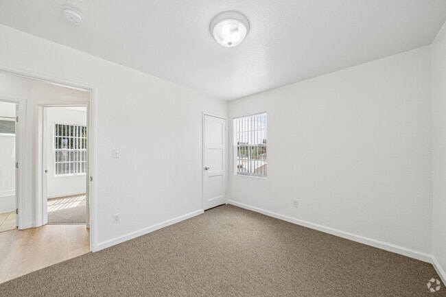2BR, 1BA - 868SF - Bedroom - Garden Villas Apartments