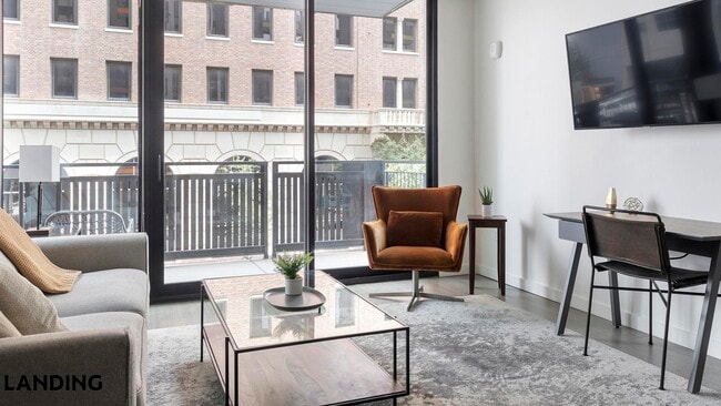 Building Photo - 20 S Stone Ave Unit 203