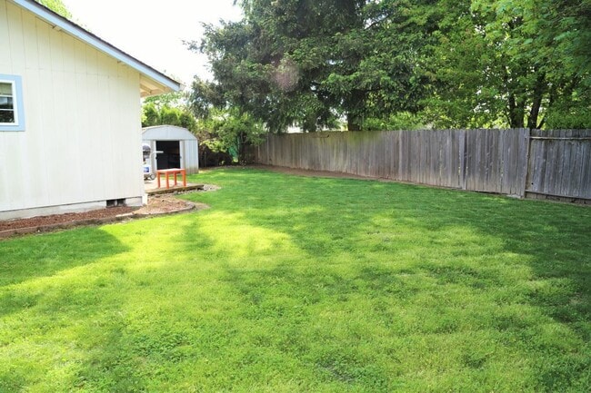 Photo - 3 Bed 2 Bath Home with Huge Fenced Yard/ Air Conditioning/ Solar Power