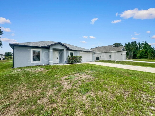 Photo - 4BR/2BA Home with High Ceilings, Garage & Large Kitchen Island