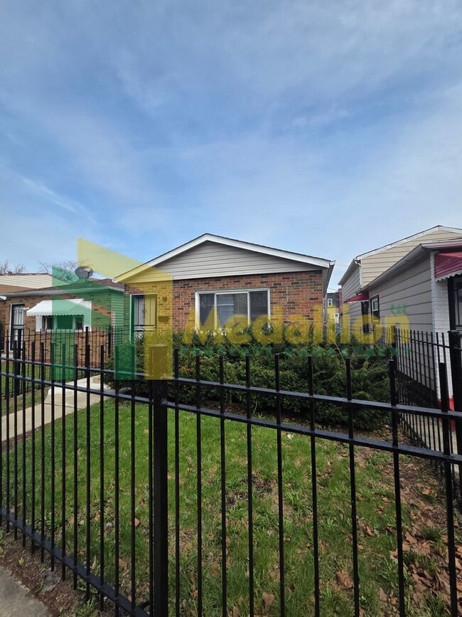 Photo - Updated 4-Bedroom Home with Finished Basement and Fenced Yard