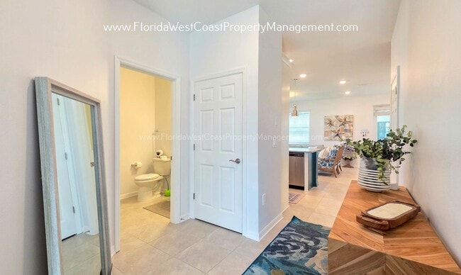 Photo - EXCEPTIONAL AND SPACIOUS FURNISHED TOWNHOME WITHIN WATERSIDE- NAUTIQUE!