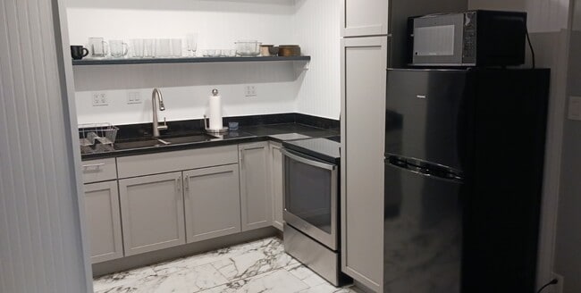 Building Photo - 7815 N Main St Unit 12