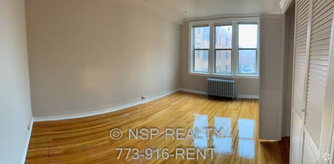 Building Photo - 1365 W Estes Ave Unit 1O Rental