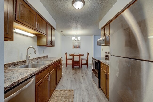 Photo - 4440 S Poplar St Unit Pine Tree Condo 1BR 1BA
