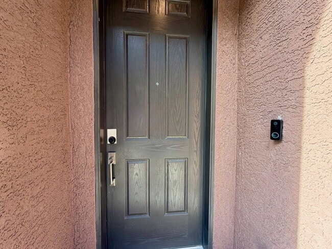 GATED 3 BED 2.5 BATH TOWNHOME WITH 2-CAR GARAGE, COVERED PATIO & COMMUNITY POOL